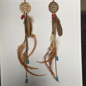 Long, feathered earrings